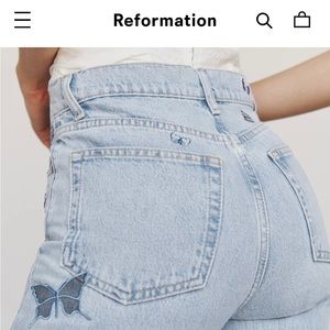 Reformation Cynthia jeans in Tahoe wash with butterfly embroidery size 27.